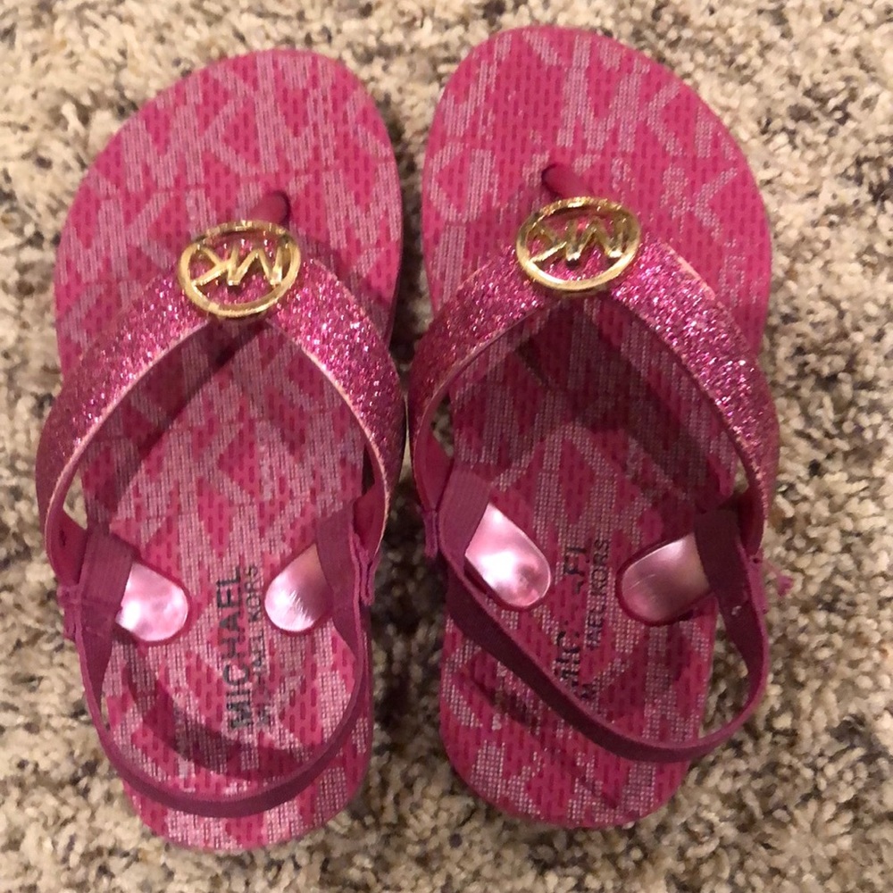 Michael Kors Fuchia Pink flip flops with backs